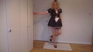 Black latex maid's dress and nude pantyhose