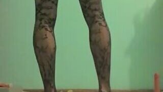 Skinny latina rides a dildo