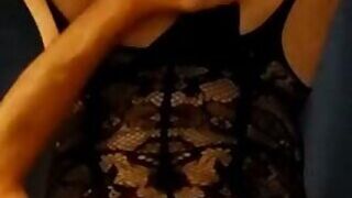 Sandy takes a self-facial in body stocking
