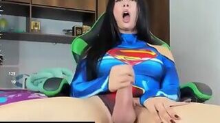 gamer girl strokes massive johnson while dressed in sultry superman costume