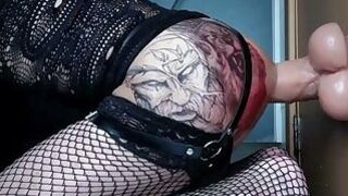 tattooed trans sitting on a huge dildo BWC 30 cm x 9 cm