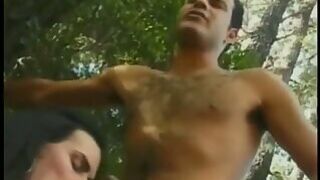 Cute young brunette Brazilaian shemale Katia enjoys dancing chocolate cha-cha-cha in the forest
