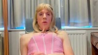 Cute sissy in pink lingerie teases her asshole