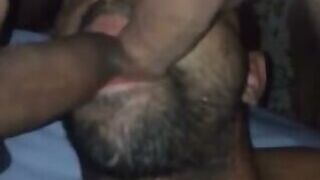 Sucking two dicks